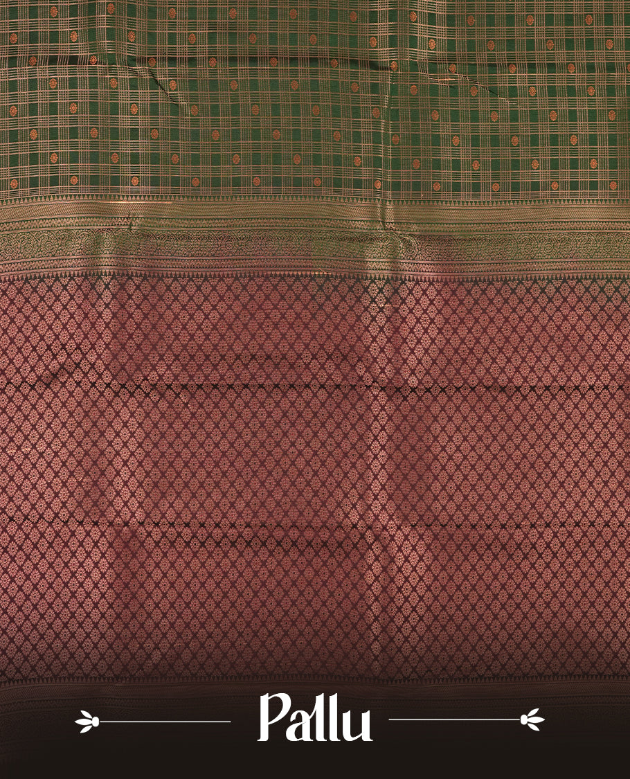 Dark green colour Semi Silk Saree with gold zari stripes on the body, paired with a contrast Burnt maroon colour pallu with gold zari traditioal border, and a matching blouse piece.