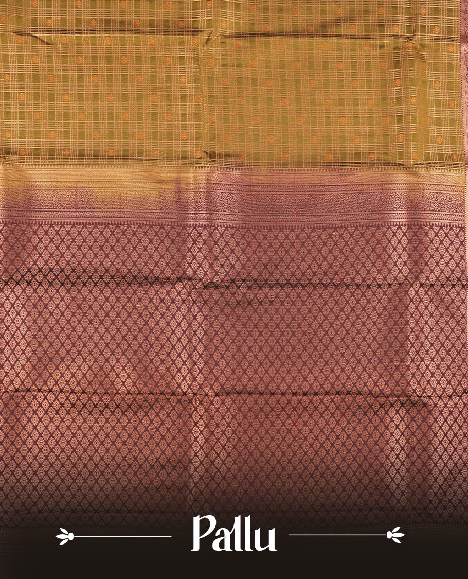 Khaki green colour Semi Silk Saree with gold zari stripes on the body, paired with a contrast Dark brown colour pallu with gold zari traditioal border, and a matching blouse piece.