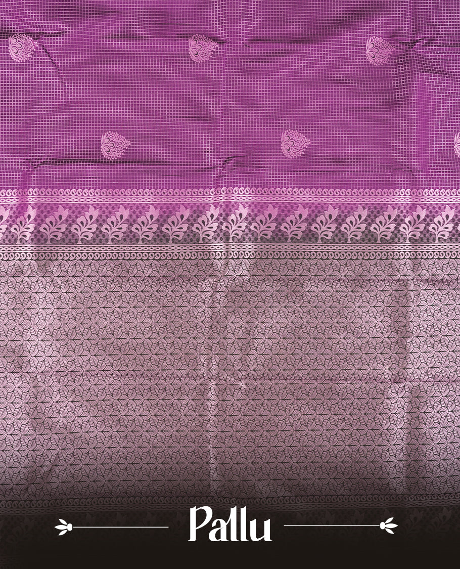 Purple colour Semi Silk Saree with rose gold zari checkered on the body, paired with a contrast Dark green colour pallu with Rose gold zari traditioal border, and a matching blouse piece.