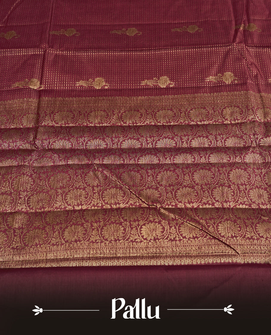 Maroon colour pure banarasi tussar Saree with antique design & golden motifs on the body, accentuated with an elegant traditional border, rich woven pallu and matching blouse piece.