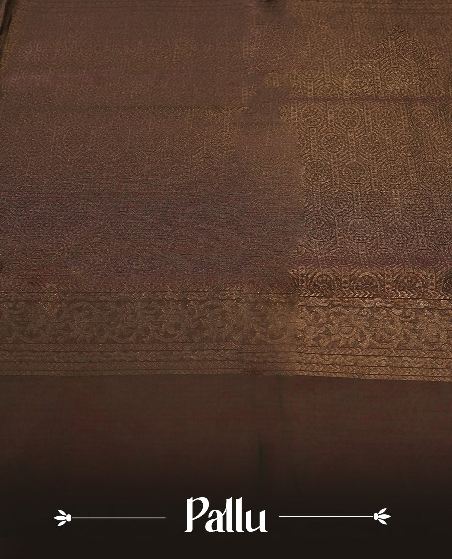 Dark greeen colour soft silk cotton saree adorned with copper zari motifs and a shimmering copper zari border, Enhanced by a beautifully rich maroon colour woven pallu & Comes with a matching blouse piece for a complete look.