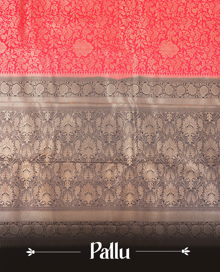 Red colour semi silk brocade saree featuring intricate Gold Floral kodi patterns across the body, complemented by a contrast navy blue colour woven border and pallu, paired with a matching blouse.