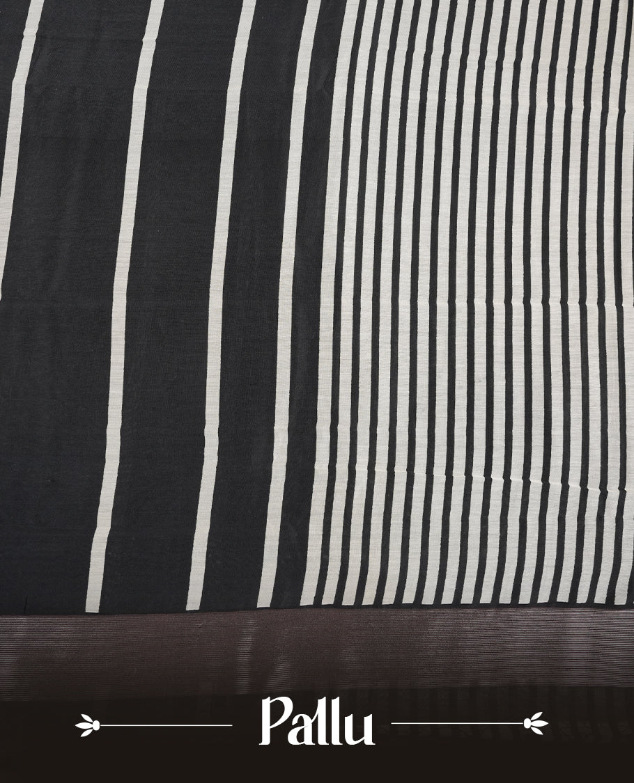 Black colour chanderi silk saree featuring white stripped print pattern across body, with Antique zari pattern border and paired with matching blouse.