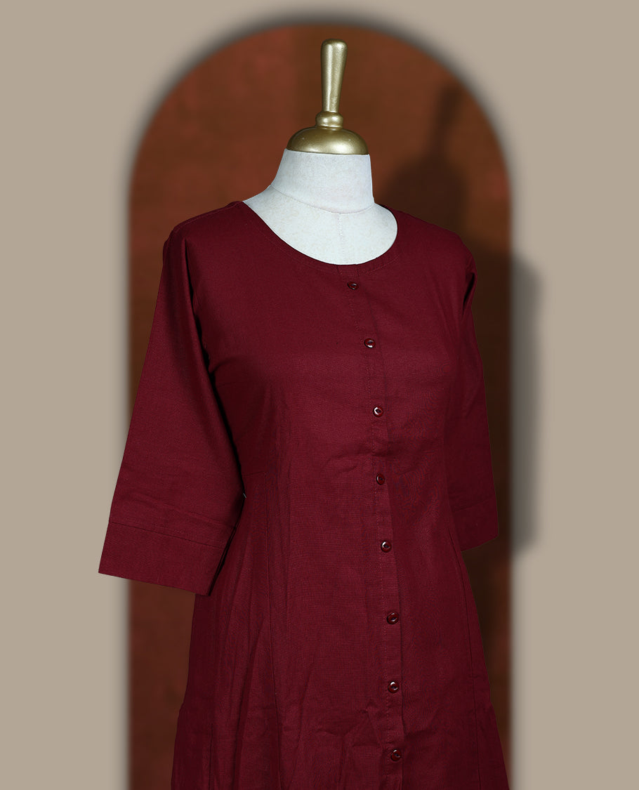 Deep maroon colour cotton coord set featuring a button down kurta with 3/4 sleeves and matching straight pants.