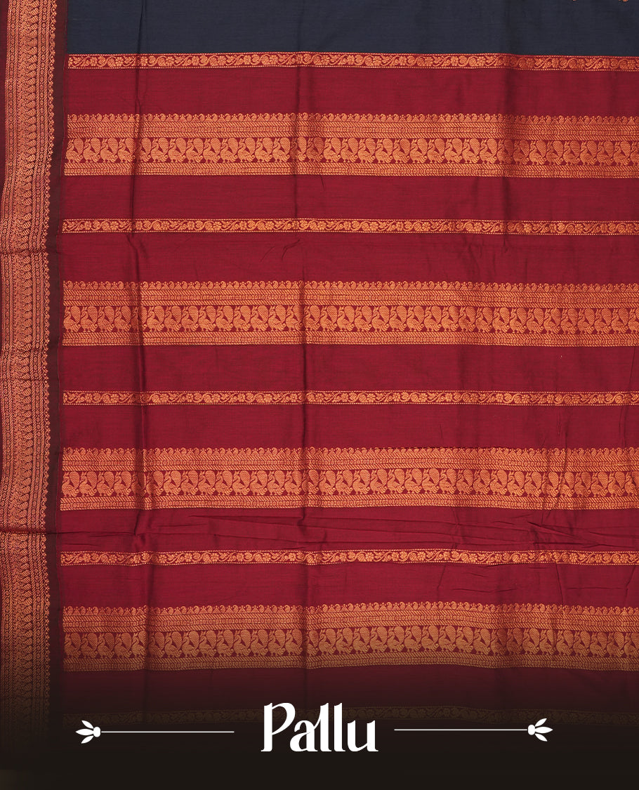 Navy blue colour Kalyani Cotton saree with deep maroon border and pallu, adorned with copper zari peacock motifs and intricate weaving & Comes with a matching blouse piece.