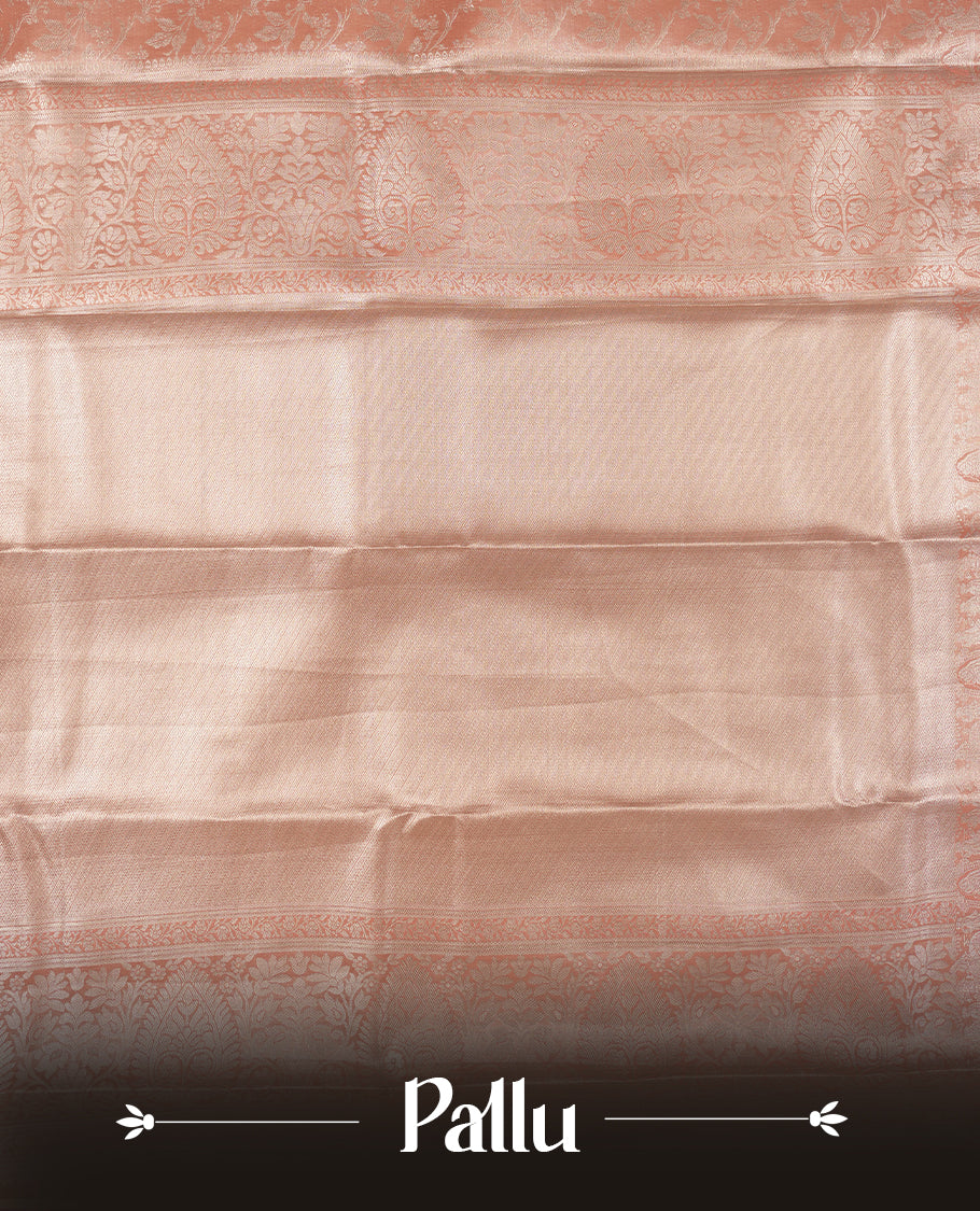 Peach colour and rose gold Zari Tissue Brocade Saree features intricate Motifs on body and rose gold colour traditional border & pallu, paired with matching blouse
