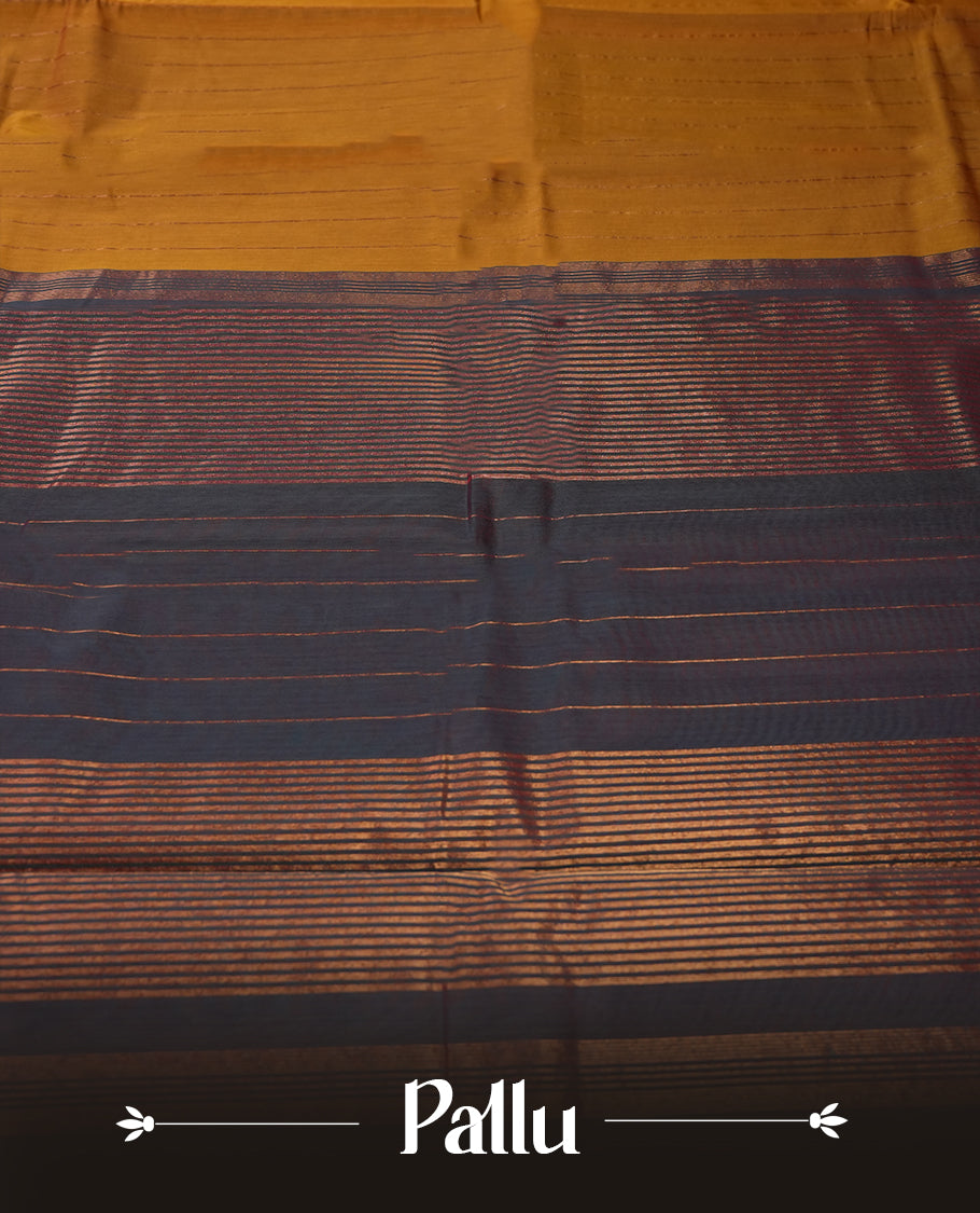 Dark Mustard colour silk cotton saree featuring with delicate vertical copper zari lines on the body & navy blue colour double shaded pallu, Crafted without a border for a classy touch, Comes with a matching blouse.