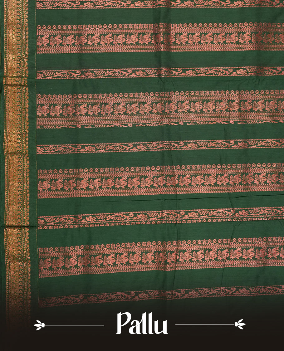 Maroon colour Kalyani cotton saree with zari motifs all over, paired with a contrasting green rich peacock copper zari woven border and pallu & comes with a matching blouse piece.