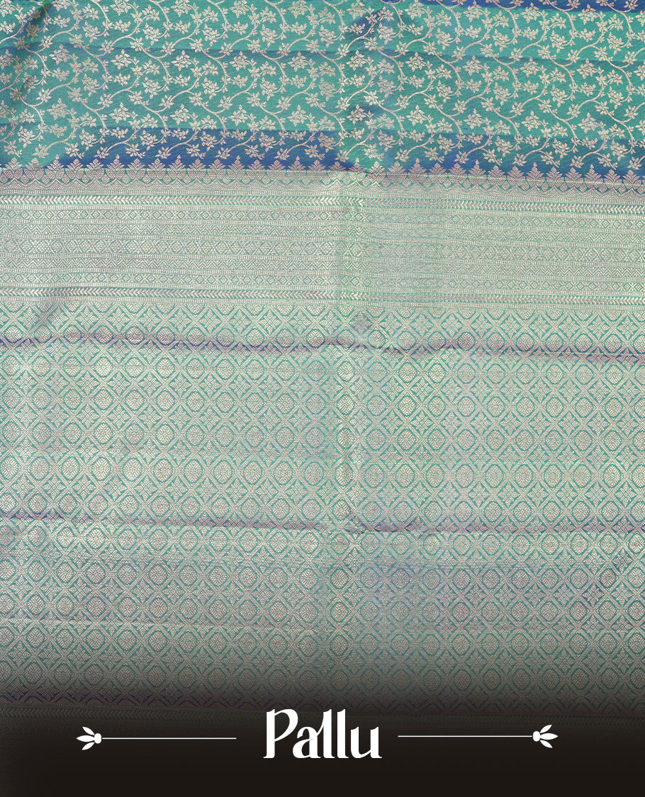 Peacocok colour Kanchipuram Samudrika Silk Saree featuring Floral kodi pattern weaving with rose gold zari jacquard and a traditional zari border, paired with a matching designer jacquard blouse piece