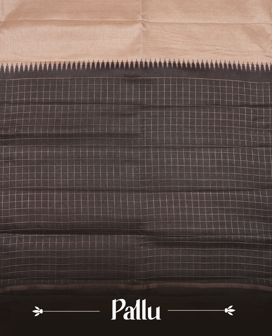 Beige colour semi tussar saree highlighting elegant plain body, contrast black colour border with gold zari box pattern, pallu and comes with matching blouse piece.