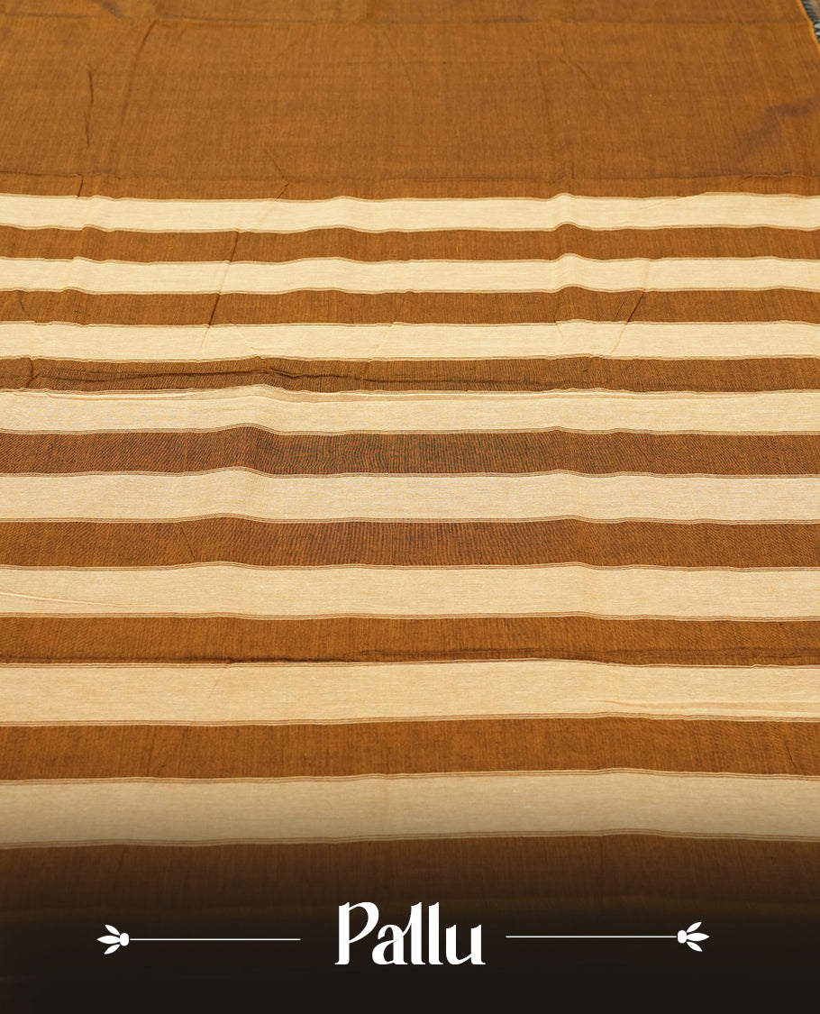 Dark mustard colour Narayanapattu cotton saree featuring a self coloured body, yellow coloured with silver zari pattern border and cream colour pallu, pairing a matching blouse piece.