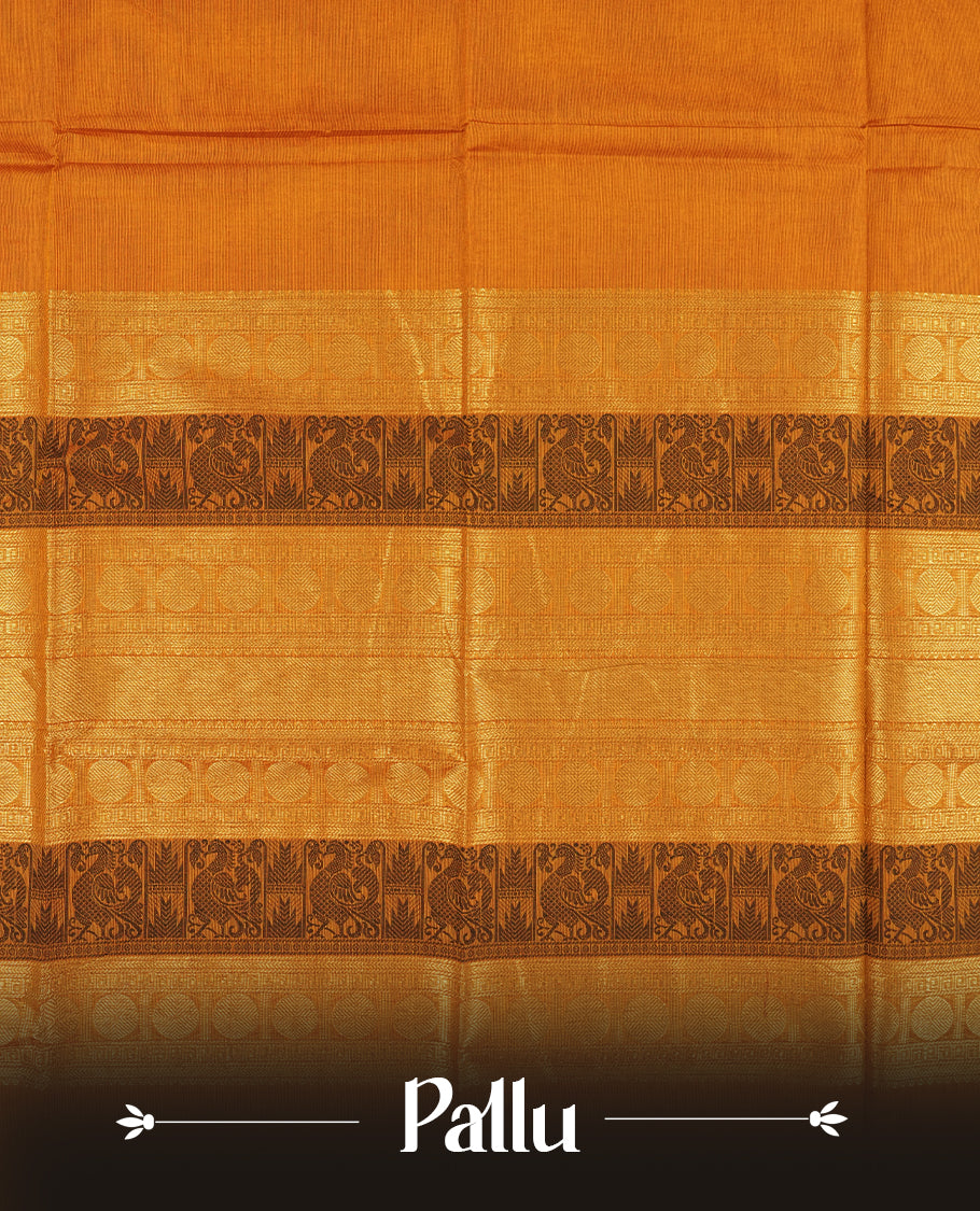 Mustard Orange colour Chettinad cotton saree adorned with small woven motifs on the body, The saree features a deep maroon border highlighted with intricate golden zari circular patterns and comes with a matching blouse piece.