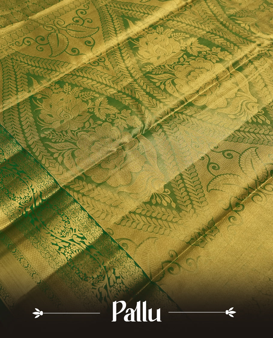 Antique golden Zari Tissue Brocade Saree features intricate a red colour flower Motifs on body and a green colour border & pallu with traditional patterns, paired with matching blouse