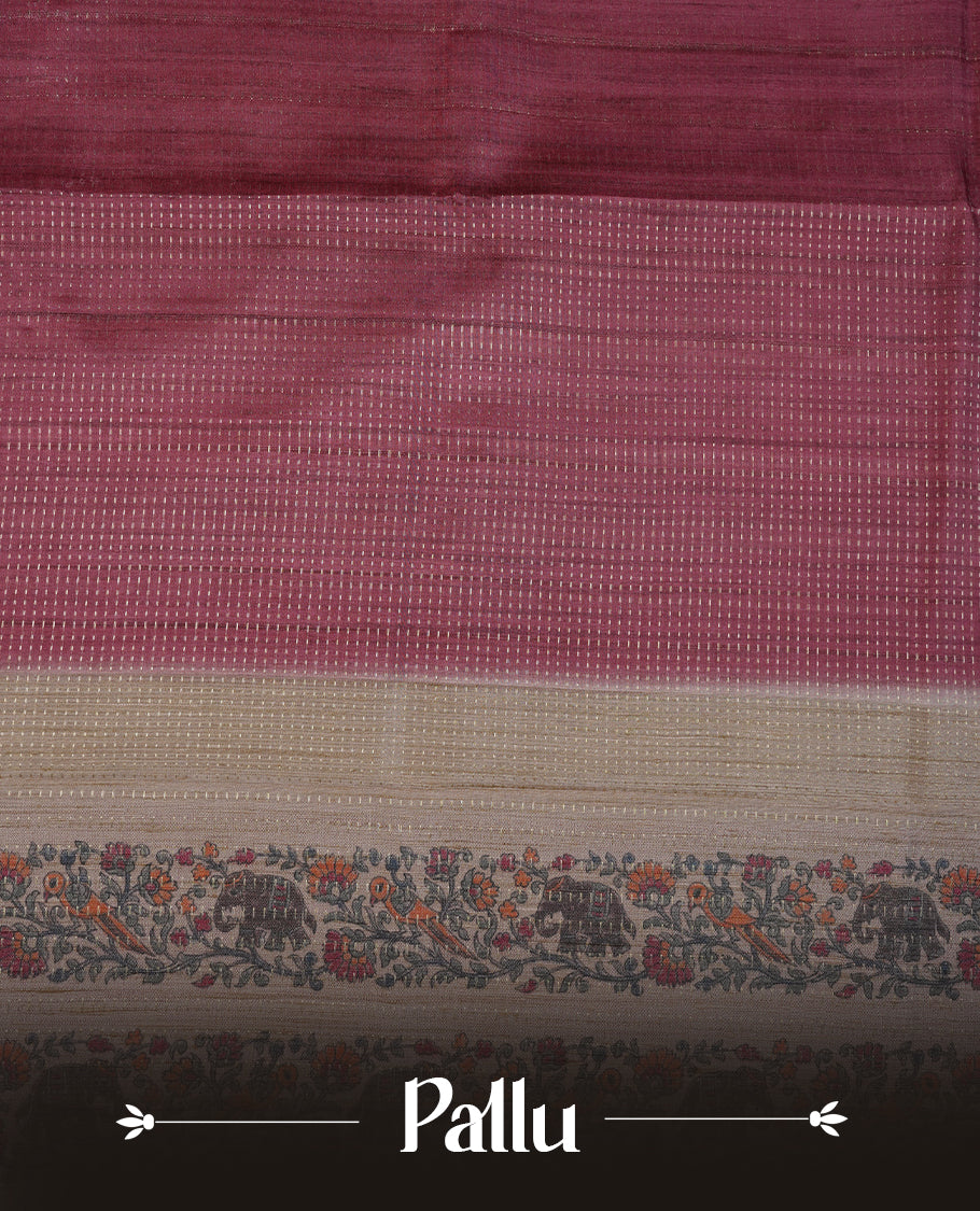 Chocolate brown colour tussar saree featuring golden zari dot stripped pattern on the body, complemented by a contrast cream colour mutlicolour floral kodi & animal print on border & pallu, paired with a matching blouse.