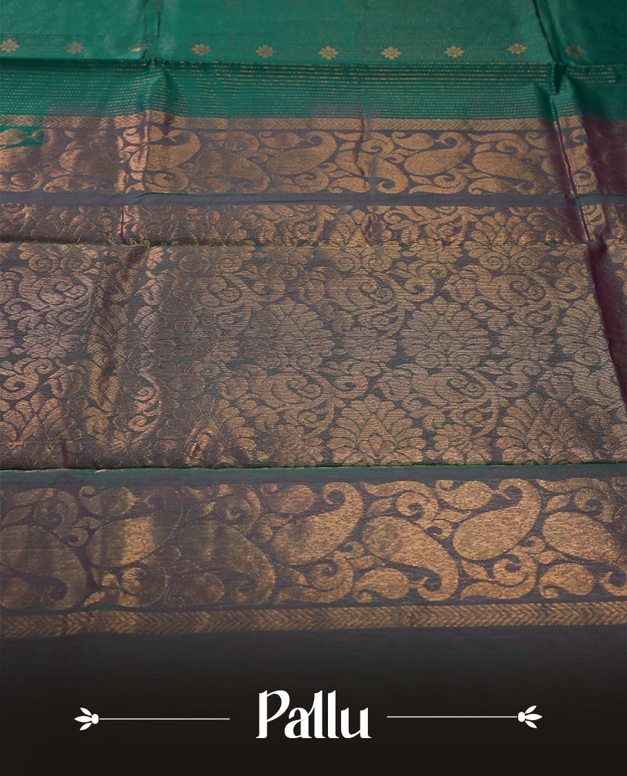 Teal colour pure handloom cotton saree featuring fine golden stripes with delicate motifs, paired with a rich zari purple double shaded border for a traditional yet elegant look, perfect for graceful occasions & Comes with matching blouse.