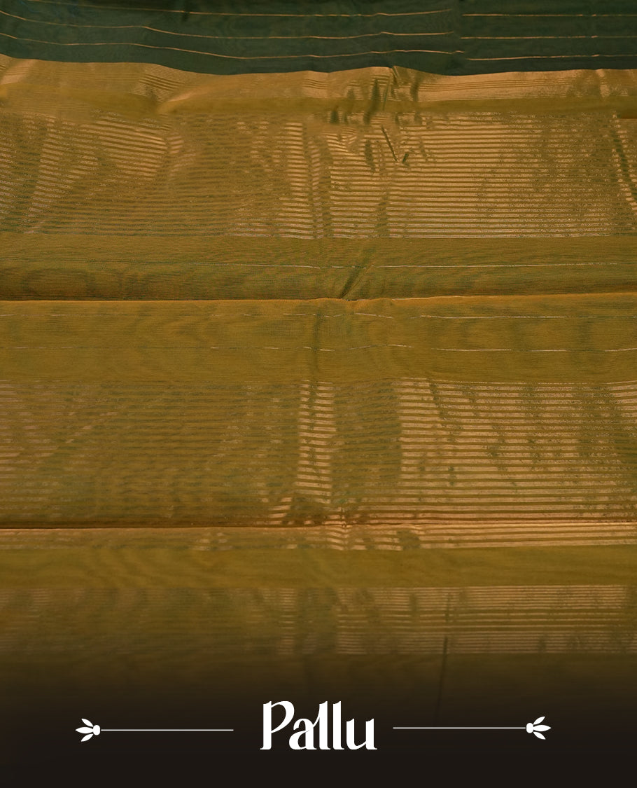 Dark green colour silk cotton saree featuring with delicate vertical copper zari lines on the body, Crafted without a border for a classy touch, Comes with a matching blouse for a perfectly coordinated look.
