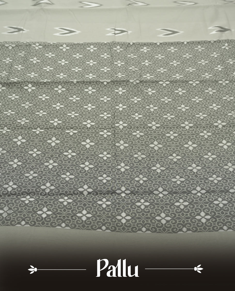 Ash Grey colour Silk Cotton Saree with Minimal Ikat Arrow Motifs Scattered on the Body, Textured Silver-Grey Geometric Pallu, Plain Matching Blouse Piece, and Clean Self-Edged Borders