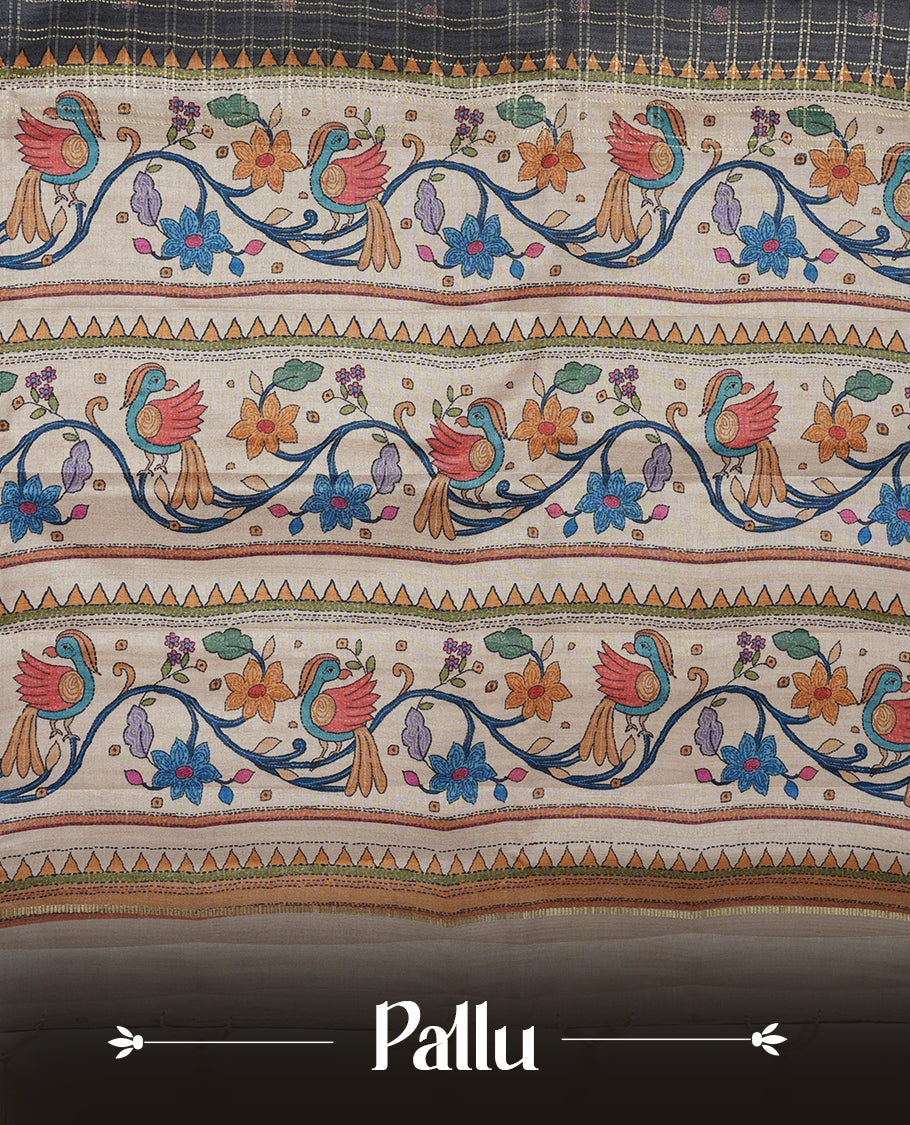 Gray colour semi tusser silk saree featuring gold zari check pattern with floral butti motifs, with contrast floral kodi & bird pattern and paired with matching blouse.