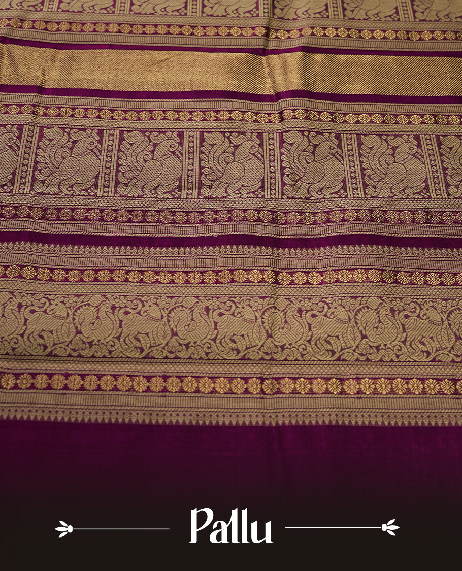 Deep Magenta colour pure Kanchi cotton saree featuring with delicate golden checks on body, paired with a contrasting beige zari woven border & Includes a matching blouse piece for a complete look.