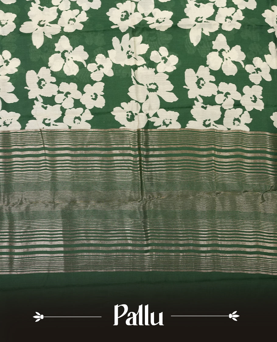 Green colour Viscos semi printed saree featuring a light golden zari border, abstract white printed motifs on the body, and comes with a matching blouse
