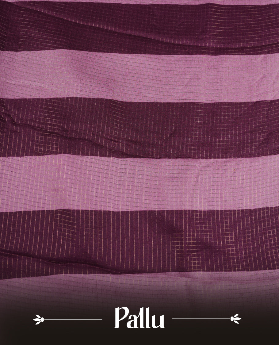 Purple colour saree featuring fine check patterns on the body, paired with contrast pink colour zari woven border and pallu. Comes with a matching blouse piece