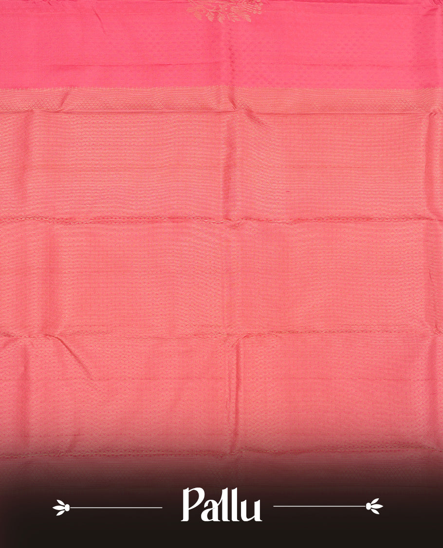 Pink colour Vasundhara silk saree adorned with all-over tiny motifs on the body, complemented by a self colour with self coloured with gold flower pattern on border and paired with a matching blouse piece.