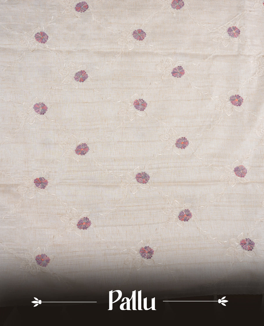 Cream colour semi tuseer silk saree featuring with Self colour thread embroidery kodi pattern & multicolour floral thread motifs all over body, pallu, and paired with matching blouse piece.