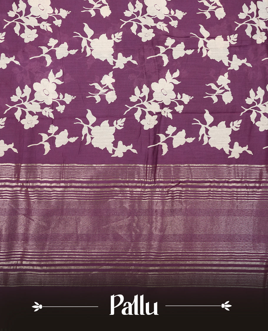 Purple colour Viscos semi printed saree featuring a light golden zari border, abstract white printed motifs on the body, and comes with a matching blouse