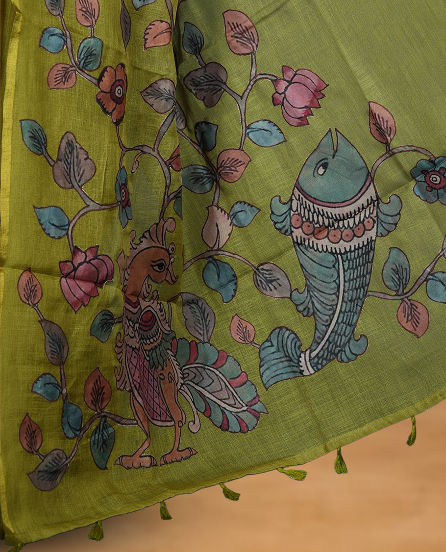 Lime green semi linen saree featuring hand painted floral and bird motifs across the pallu and border finished with subtle tassel detailing and paired with a matching floral print blouse