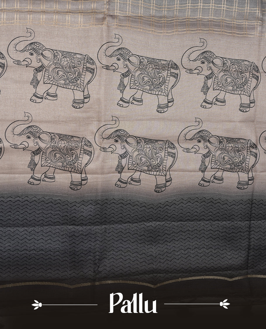 Gray colour semi tusser silk saree featuring Gold zari check pattern across body, faded contrast cream colour border with elephant print and paired with matching blouse.