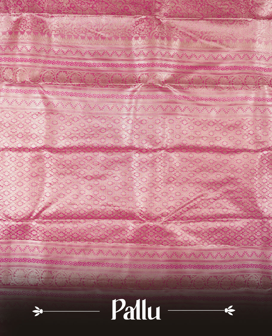 Pink colour and rose gold Zari Tissue Brocade Saree features intricate floral Motifs on body and self coloured border and traditional pallu, paired with matching blouse