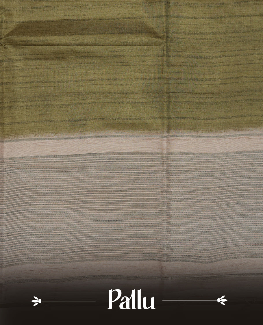 Green colour semi tusser silk saree featuring contrast cream colour London bridge printed pattern border and paired with matching blouse.