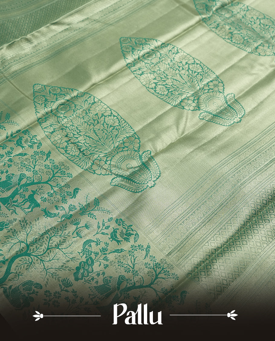 Golden colour Zari Tissue Brocade Saree features intricate tree Motifs on body and fancy border & pallu with floral patterns, paired with matching blouse