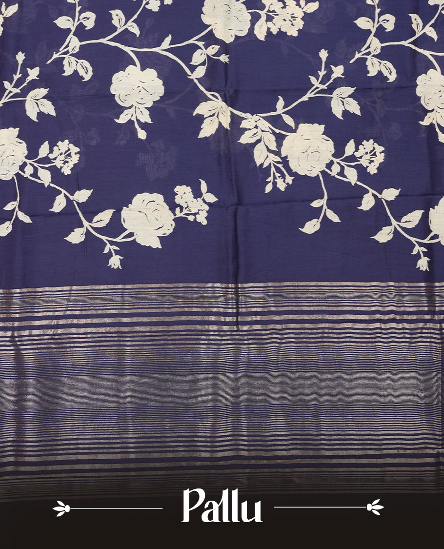 Dark blue colour Viscos semi printed saree featuring a light golden zari border, abstract Off white printed motifs on the body, and comes with a matching blouse