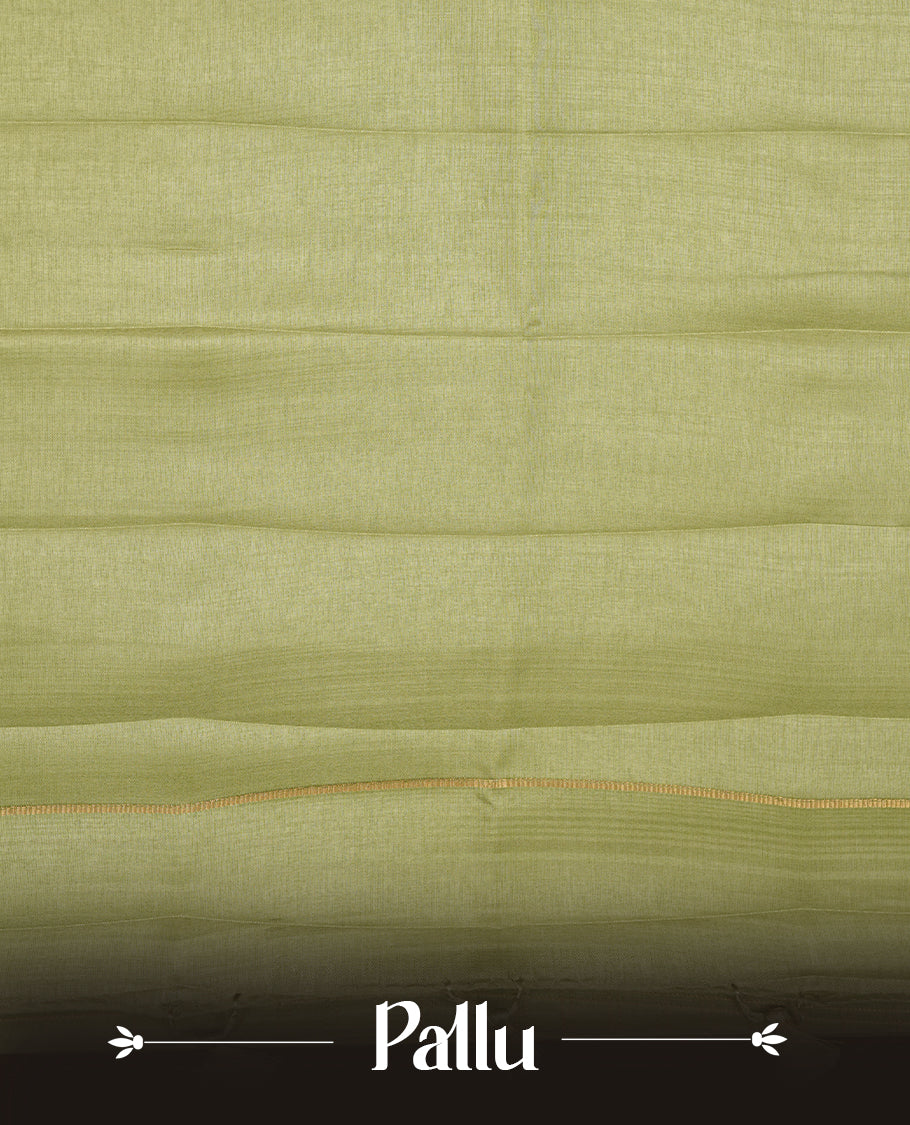 Pastel green colour semi tussar silk saree highlights gold zari check pattern across body, border, pallu and paired with matching blouse piece.
