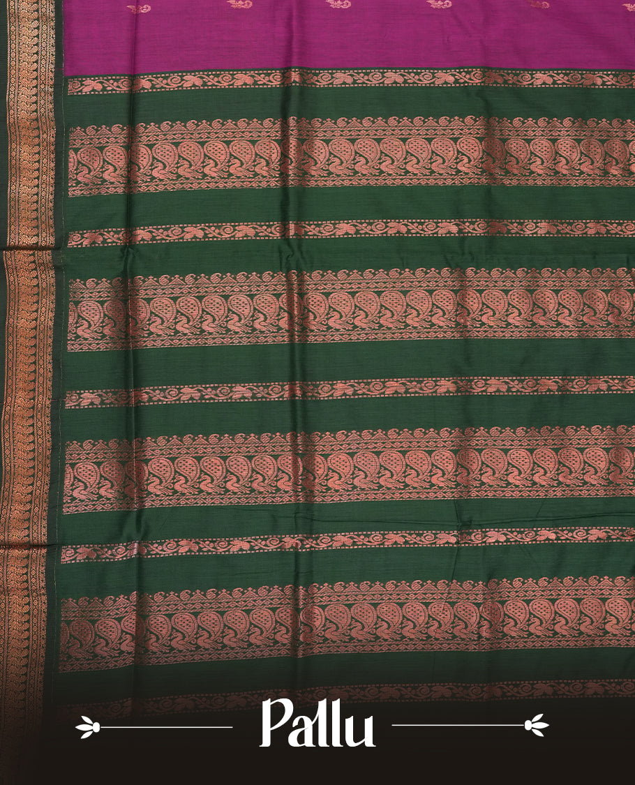 Purple colour Kalyani cotton saree with intricate small motifs all over, paired with a contrasting dark green rich zari woven border and rich peacock worked pallu & Comes with a matching blouse piece