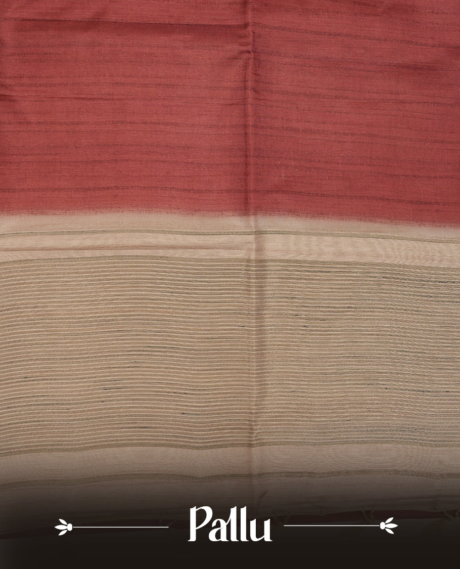 Brick red colour semi tusser silk saree featuring contrast cream colour London bridge printed pattern border and paired with matching blouse.