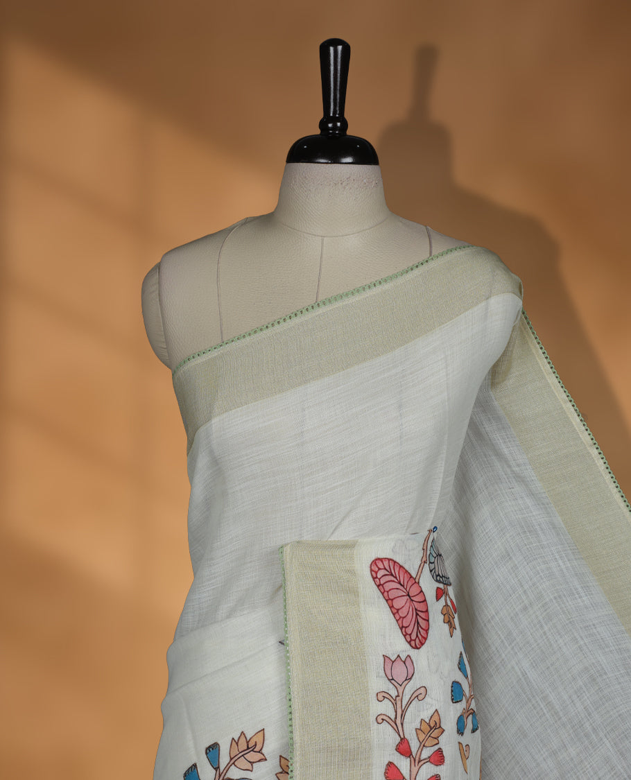 Cream colour cotton linen silk saree featuring Floral & brids printed pattern on body, golden simple border with green colour pallu and comes with a matching blouse