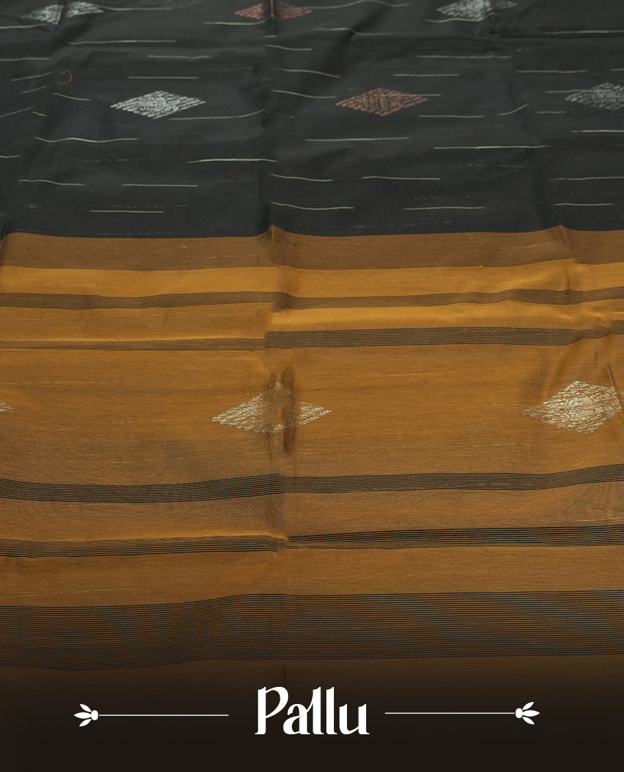Black Cotton Saree with Silver and Bronze/Copper Diamond Butta Body, Featuring Gold/Mustard Zari-Accented Pallu with Scalloped Border Edge, Paired with Matching Gold/Mustard Plain Blouse Piece