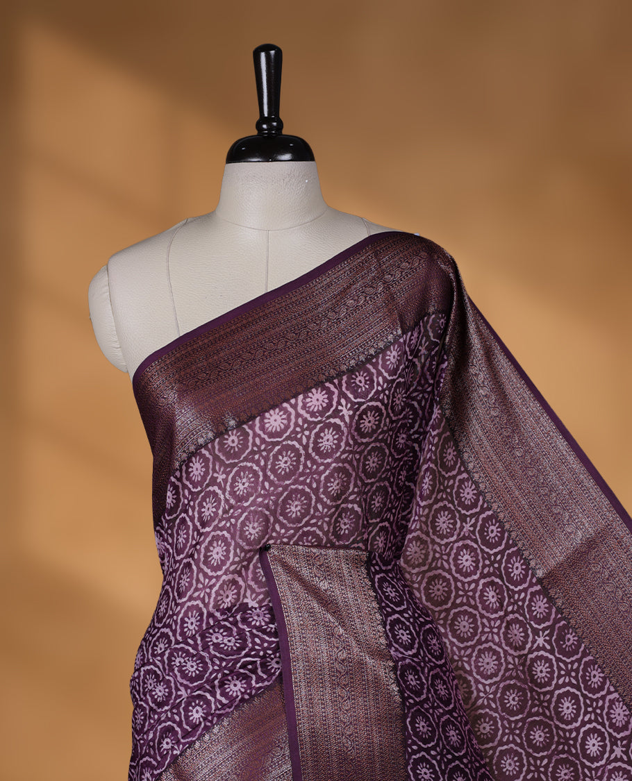 Purple colour chanderi silk saree with Floral block print On body, compilmented by self colour border with antique zari pattern and a matching blouse.