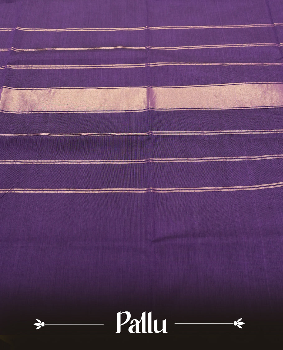 Royal Purple colour Silk Cotton Saree with Antique Gold Zari Border Showcasing Peacock Motifs and Geometric Stripes, Simple Body, Rich Pallu with Gold Stripes, and a Coordinated Matching Blouse Piece