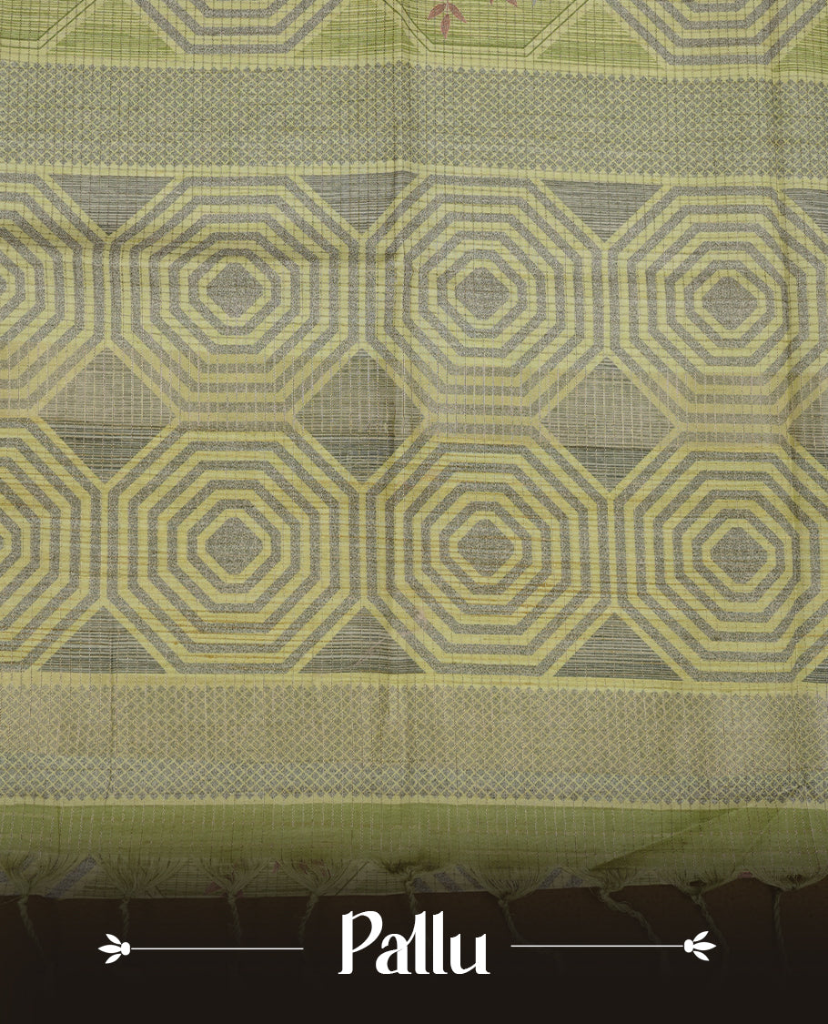 Leaf green colour semi tussar silk saree, featuring subtle hexagonal geometric patterns across the body, a textured pallu with fine detailing, and finished with a matching blouse.