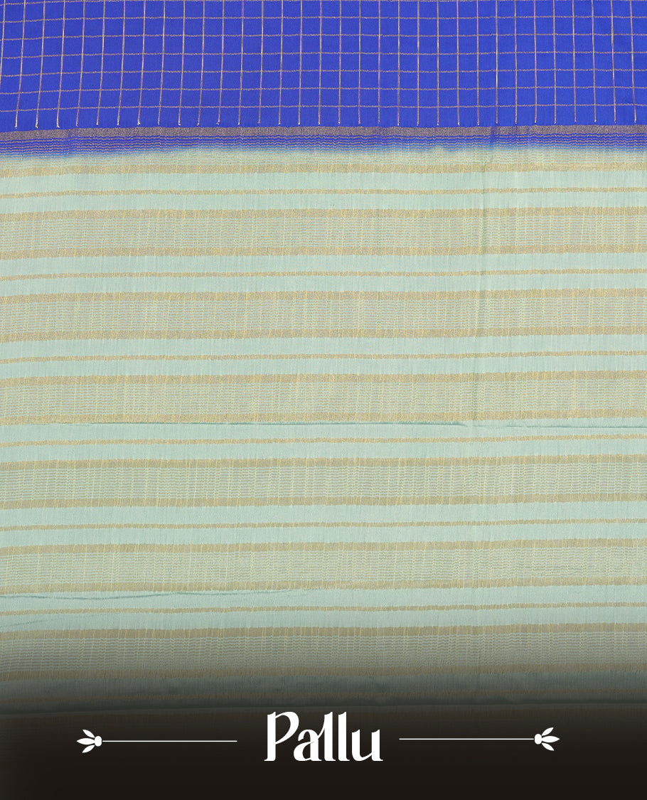 Blue colour mysore crepe saree with gold zari check pattern on body, complemented by contrast sky blue colour border featuring peacock and chakkram motifs, paired with matching blouse.