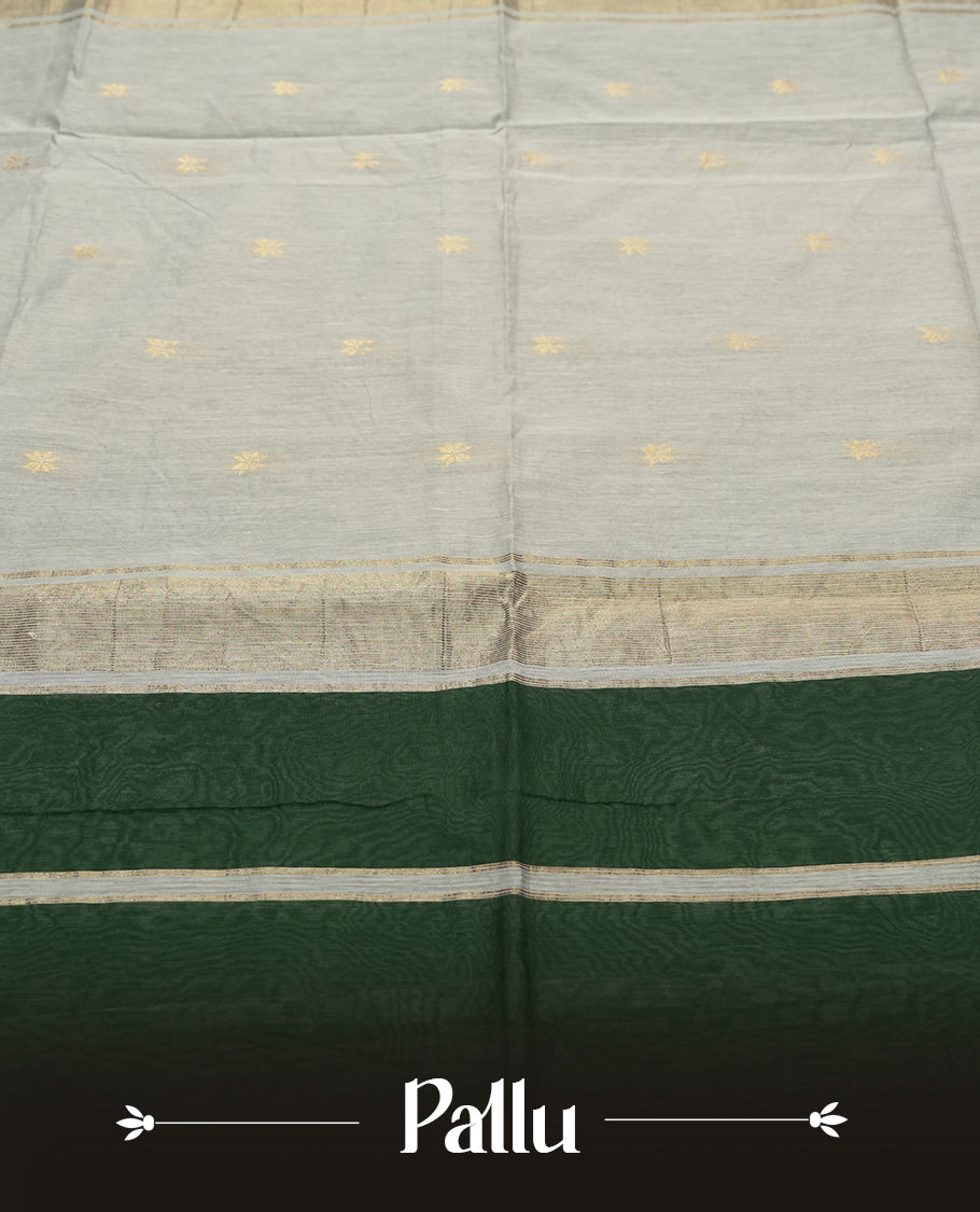 Deep Emerald Green and Silver Grey colour Silk Cotton Saree with Tiny Gold Zari Star Buttas on the Body, Slim Floral Zari Borders, Broad Silver Tissue Panel across the Pallu with subtle stripes, and a Plain Silver Grey Blouse with Matching Border