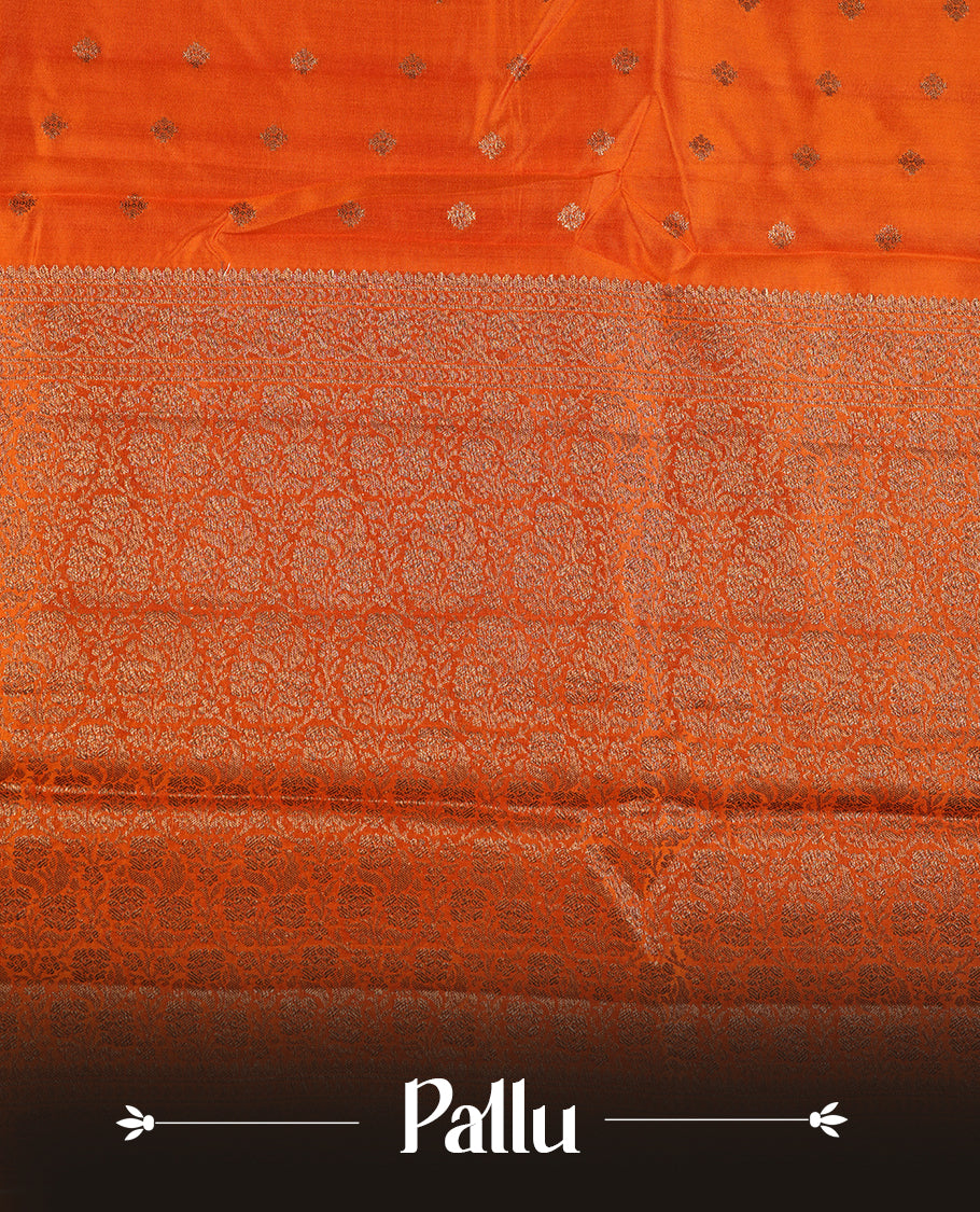 Orange colour Pure tussar Banarasi saree featuring Gold zari motifs on body, self colour gold zari border border, and a matching blouse piece.