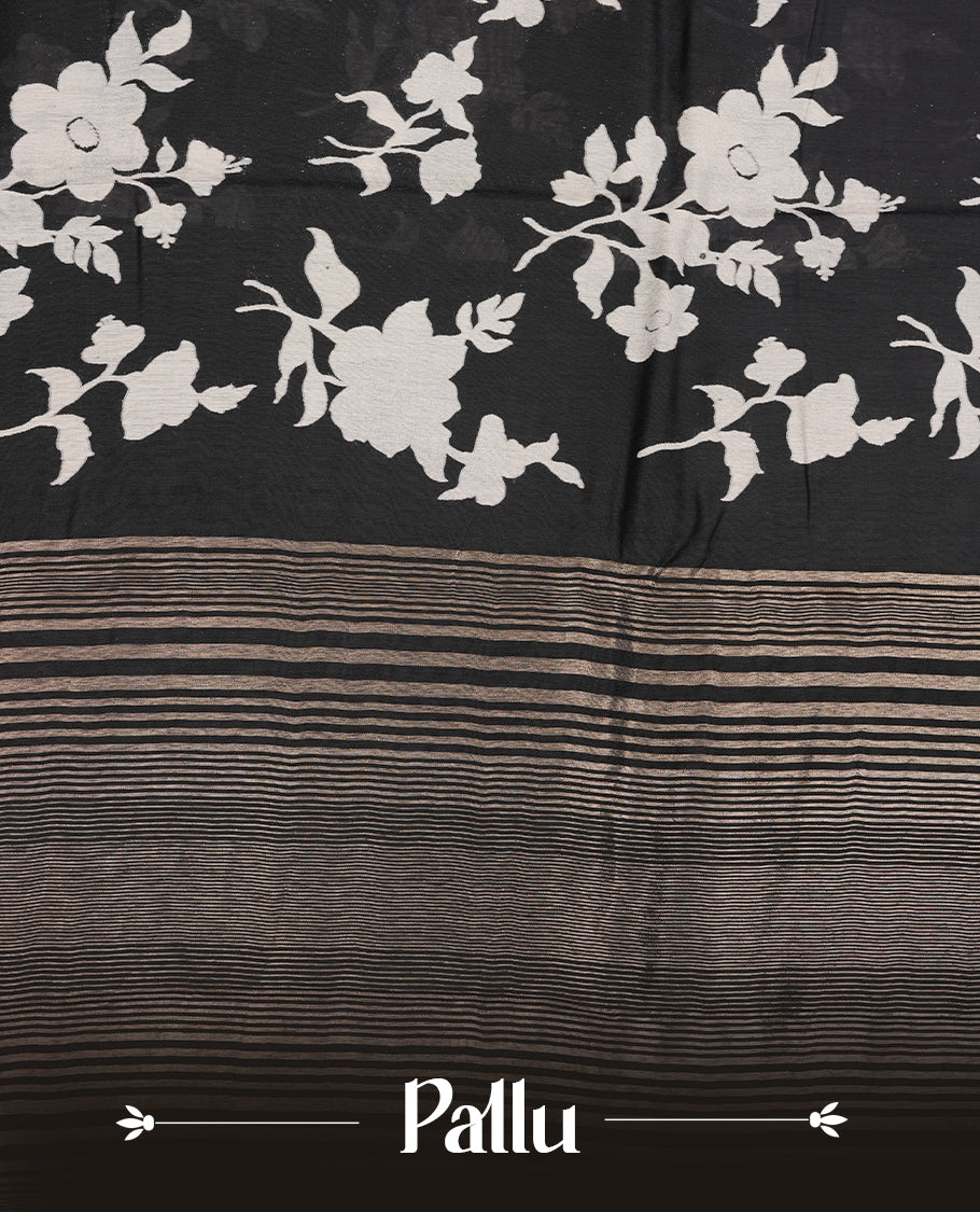 Black colour Viscos semi printed saree featuring a light golden zari border, abstract off white printed motifs on the body, and comes with a matching blouse