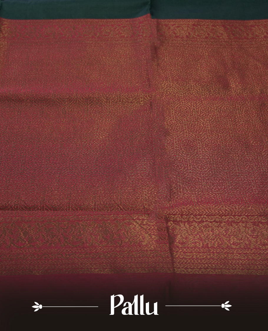 Deep greeen colour soft silk cotton saree adorned with copper zari motifs and a shimmering copper zari border, Enhanced by a beautifully rich maroon colour woven pallu & Comes with a matching blouse piece for a complete look.