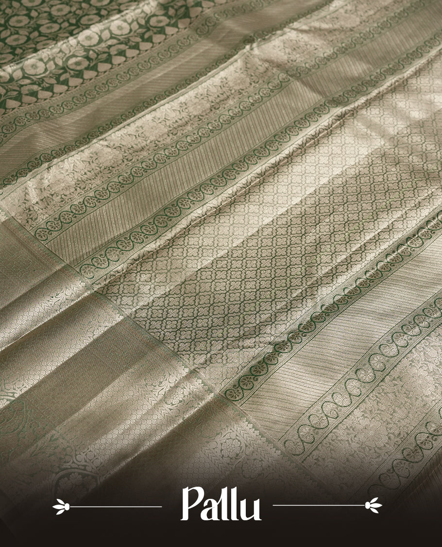 Dull green colour and Antique gold Zari Tissue Brocade Saree features intricate floral Motifs on body and fancy border & pallu with floral patterns, paired with matching blouse