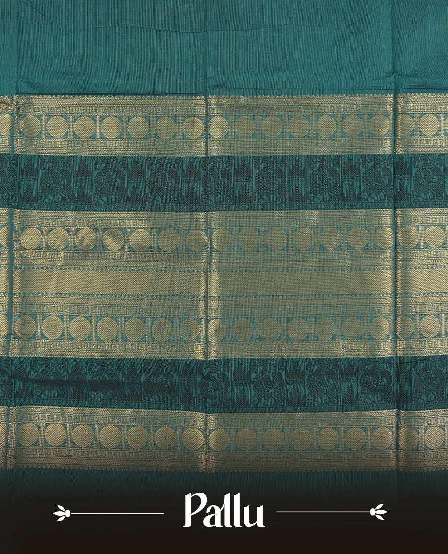 Teal blue colour Chettinad cotton saree featuring a rich contrast navy blue colour border adorned with intricate golden zari circular motifs and geometric designs & it comes with a matching blouse piece.