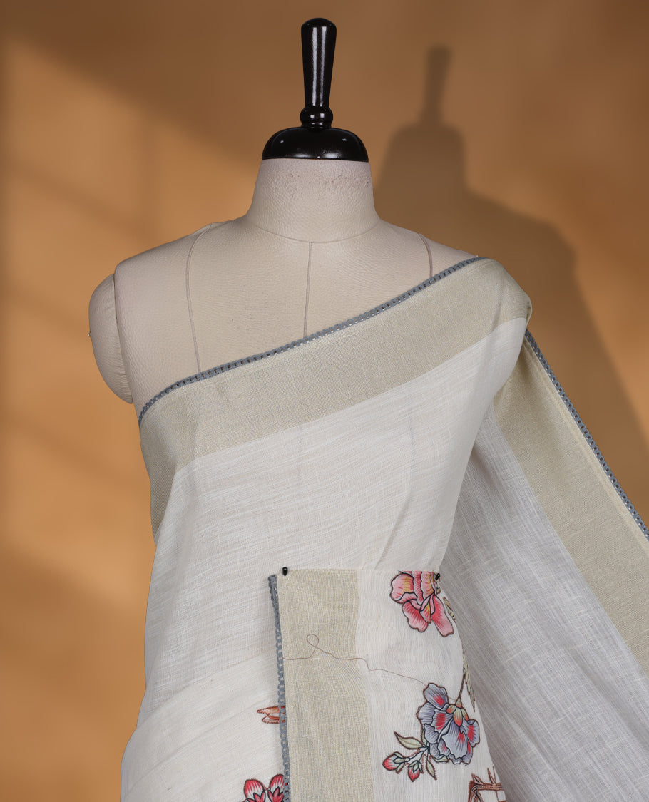 Cream colour cotton linen silk saree featuring Floral & brids printed pattern on body, golden simple border with gray colour pallu and comes with a matching blouse